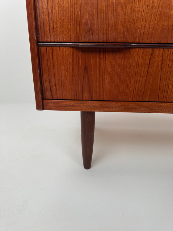 Image 1 of Deense teakhouten boekenkast met uitschuifbaar bureau – elegante werkplek in mid-century stijl