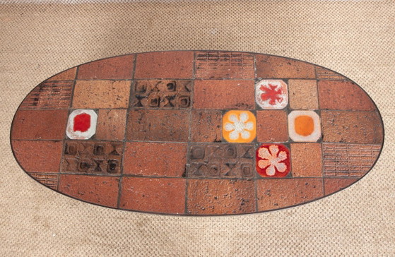 Image 1 of Tavolino da caffè in pietra lavica, ceramica e acciaio, disegnato da Jean Jaffeux nel 1960.