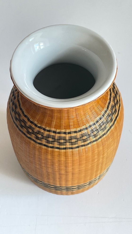 Image 1 of Vintage Woven Bamboo and Fine Porcelain Vase