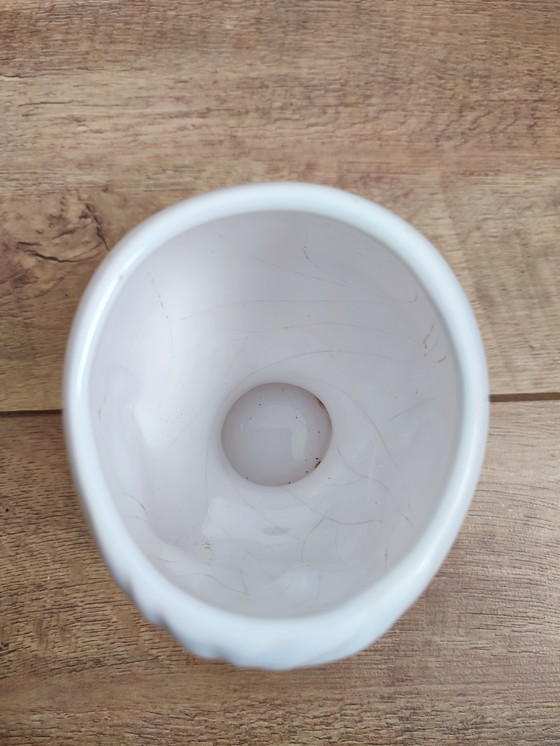 Image 1 of Pot de fleurs vintage en céramique blanche, motif tête d'enfant.