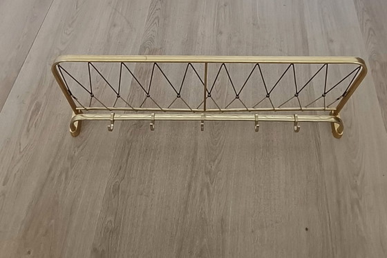 Image 1 of Fifties string coat rack with five coat hooks
