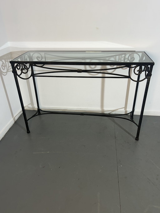 Twee gesmede console tafels.