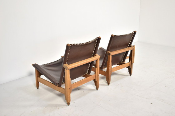 Image 1 of Paar lederen loungestoelen met kruk van Arte Sano, Columbia 1960