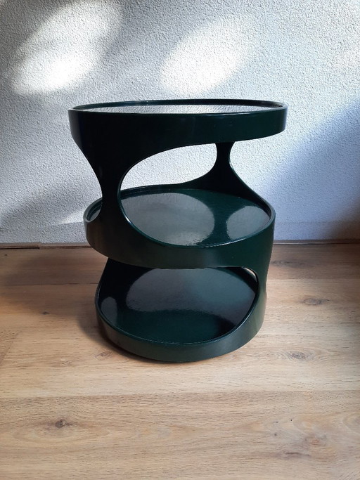 Mesa auxiliar Dutch Design Nebu verde de fibra de vidrio con tapa redonda de cristal ahumado