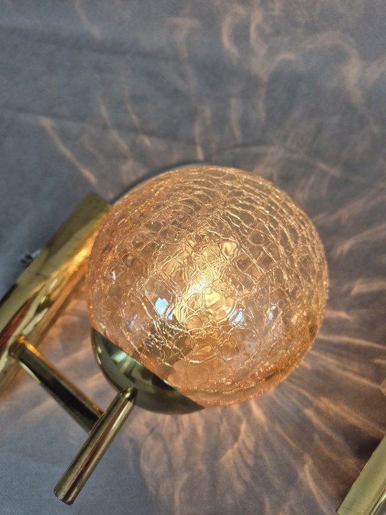 Image 1 of Set van twee Fischer 724/1 messing wandlampen met craquelé glazen bol, mid-century stijl, E14 fitting.
