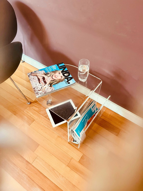 Image 1 of 80's Acrylic side table on wheels + reading material