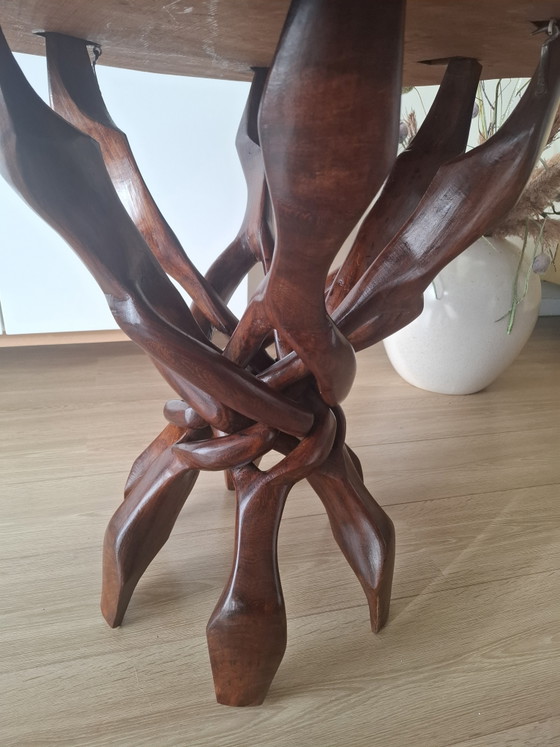 Image 1 of Interlocking African "unity" table.