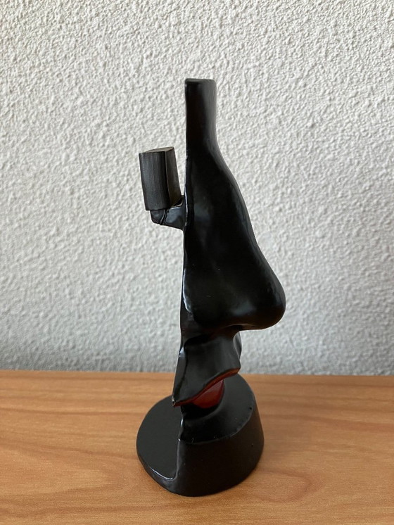 Image 1 of Salvador Dali glasses stand. Familiar design nose with mustache and lips.