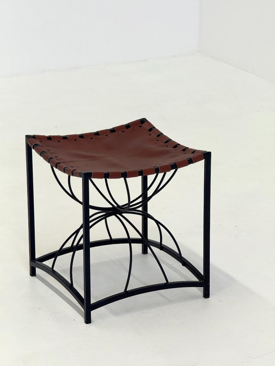 Image 1 of French elegant vintage stool with black metal and brown leather
