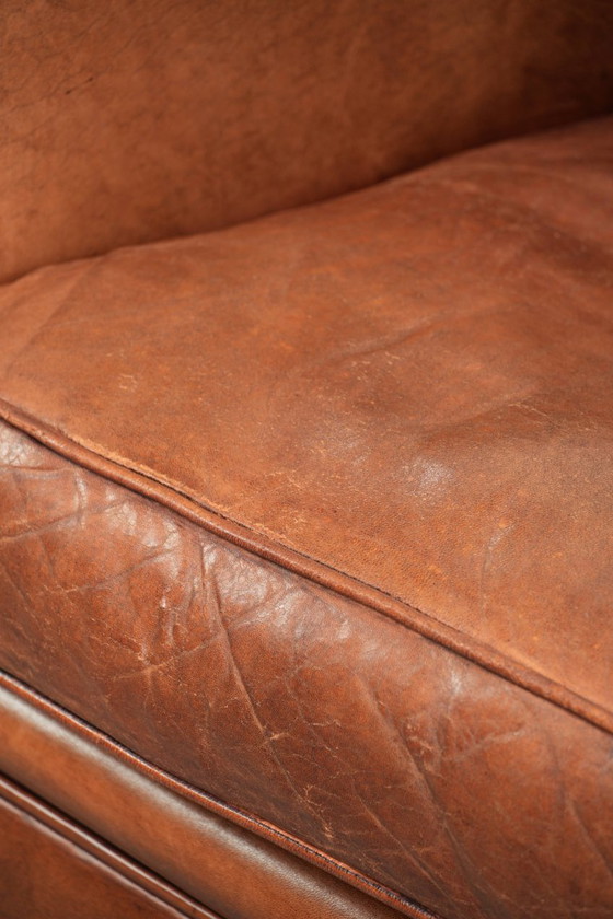 Vintage schapenleren armchair met een comfortabele zit en afgewerkt met siernagels – Fauteuils, Leather (photo 12 of 14)