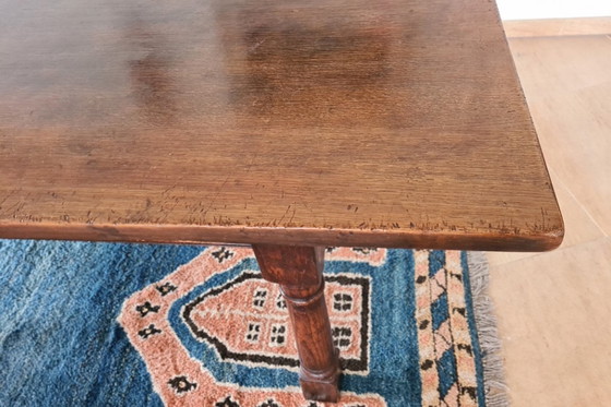 Image 1 of Massief eikenhouten eettafel met 6 bijpassende stoelen 