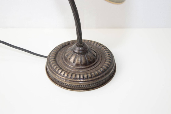 Image 1 of Vintage brass table lamp with curved arm and glass shade