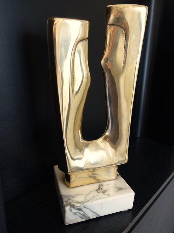 Image 1 of Sculpture en laiton poli d'après Gérard Koch.