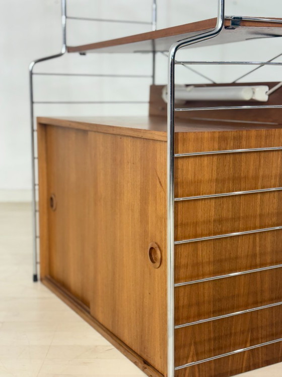 Image 1 of Teakhouten boekenkast "String Continental" van Nils Strinning - Wandplank uit het midden van de 20e eeuw - jaren 60