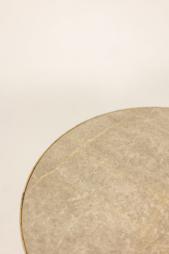 Image 1 of Pedestal table. Gilt metal base and grey marble top. 20th century.