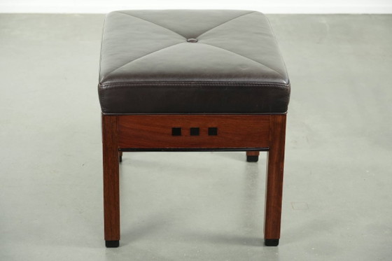 Image 1 of Luxe Schuitema Art Deco design set bestaande uit een fauteuil en hocker uit de Decoforma serie in chocolade bruin rundleer