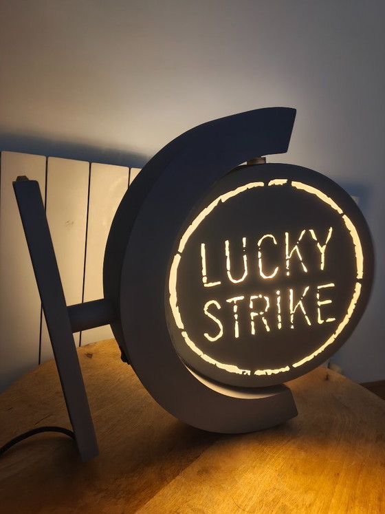 Image 1 of Vintage draaiend lichtreclamebord Lucky Strike