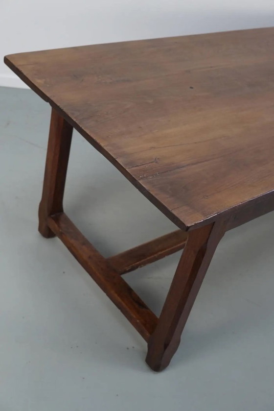 Image 1 of Early 20th-century French rustic country dining table made of oak and elm