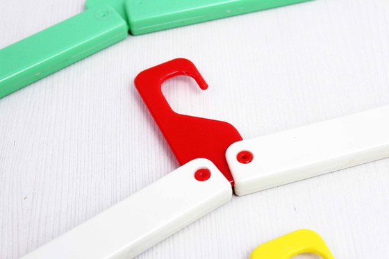 Image 1 of Set of 4 vintage folding hangers