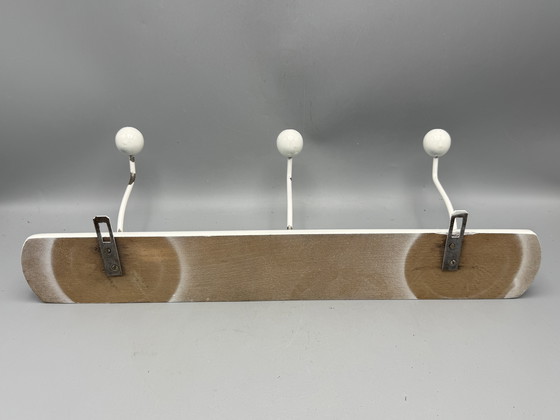 Image 1 of Mid - Century coat rack sleek and timeless design