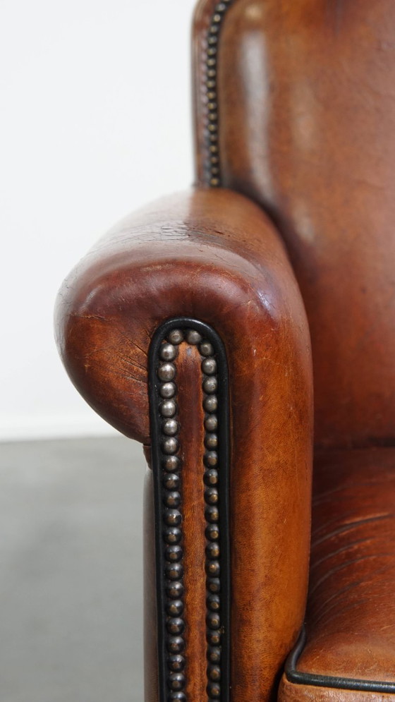 Image 1 of Schapenleren design fauteuil/ armchair in een cognac kleur