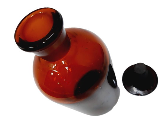 Image 1 of Vintage amberkleurige glazen apothekersfles met grondstop