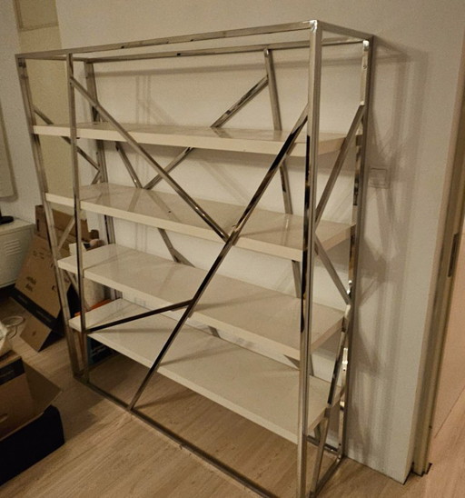 Stylish cabinet from Beliani in white with stainless steel frame