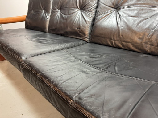 Mid-Century Design Komfort Solid Teak Wooden 3-Seat Sofa with Black Leather Cushions Attributed to Sven Ellekaer by Komfort