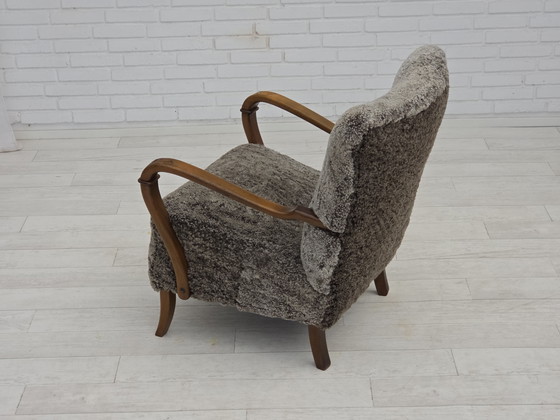 Image 1 of 1960s Reupholstered Danish Armchair in New Zealand Genuine Sheepskin