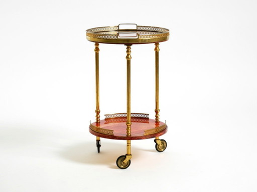 Chariot de service ou de bar rond Aldo Tura des années 1960, petit modèle, en cuir de chèvre rouge | Fabriqué en Italie