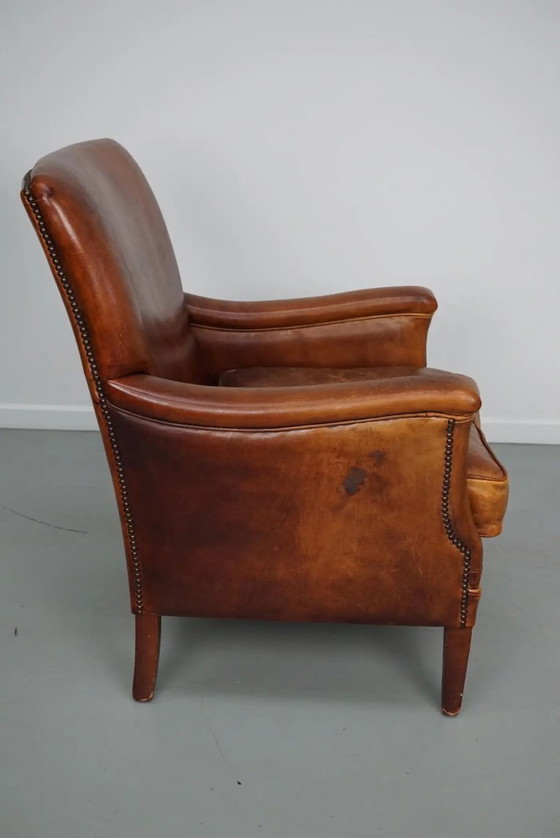 Image 1 of Vintage Nederlandse clubfauteuil van cognackleurig leer