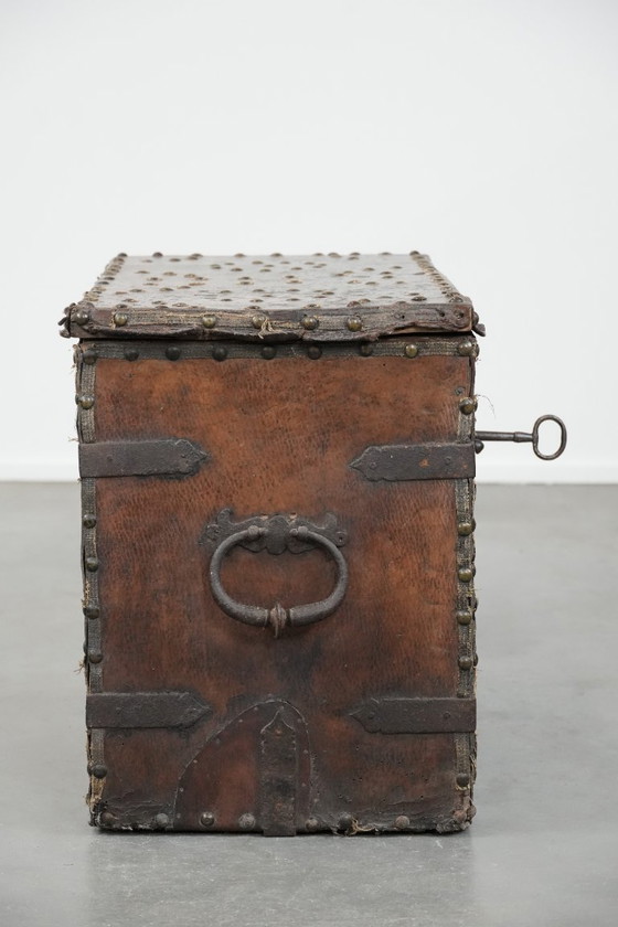 Image 1 of Antique 17th century chest/safe covered with leather and original key