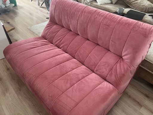 Pink velvet sofa from Homestock