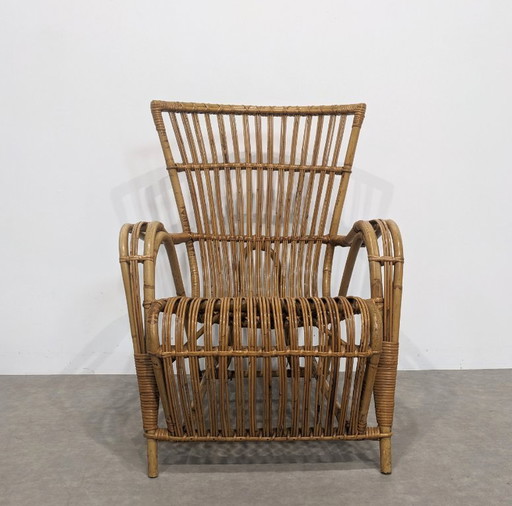 Fauteuil vintage en rotin.  70s.