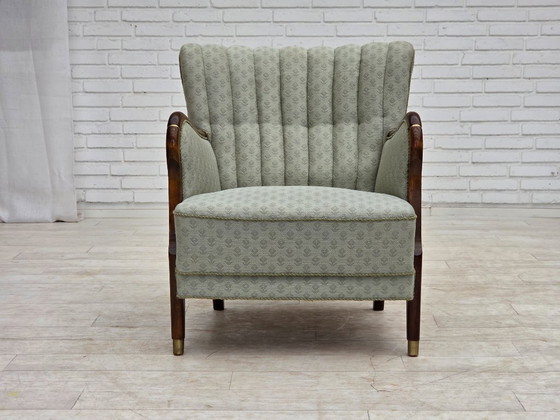 Image 1 of Deense fauteuil uit de jaren 60, lichtblauwe meubelstof, beukenhout.