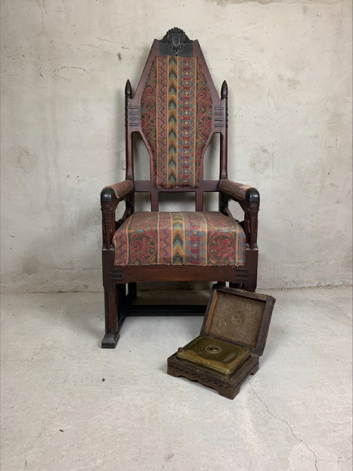 Attributed to Jac. Van Den Bosch, an Amsterdam School armchair with foot warmer