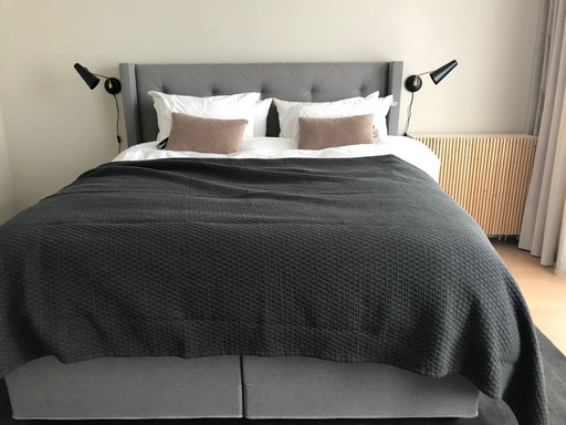 Swiss Sense, bed head, grey capitonné