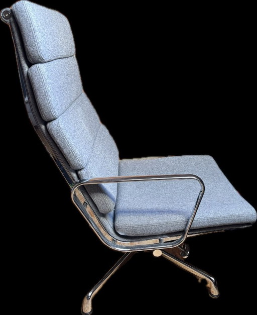 Eames-style lounge chair with footstool