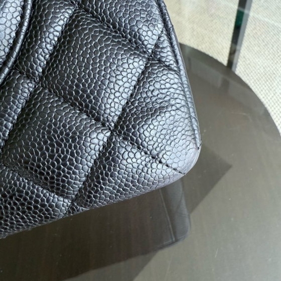 Image 1 of Borsa Chanel Classic Flap Maxi - Caviar 33CM, chiusura singola con patta, trapuntata, nera, con finiture argentate, serie 13