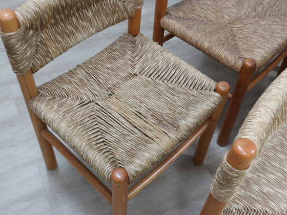 Image 1 of Juego de 8 sillas estilo Charlotte Perriand de los años 60, de paja tejida y madera.