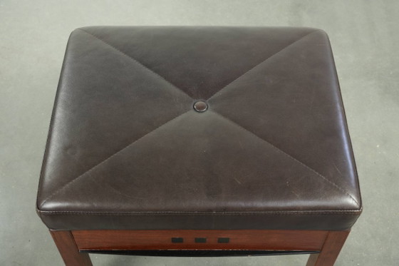 Image 1 of Luxe Schuitema Art Deco design set bestaande uit een fauteuil en hocker uit de Decoforma serie in chocolade bruin rundleer