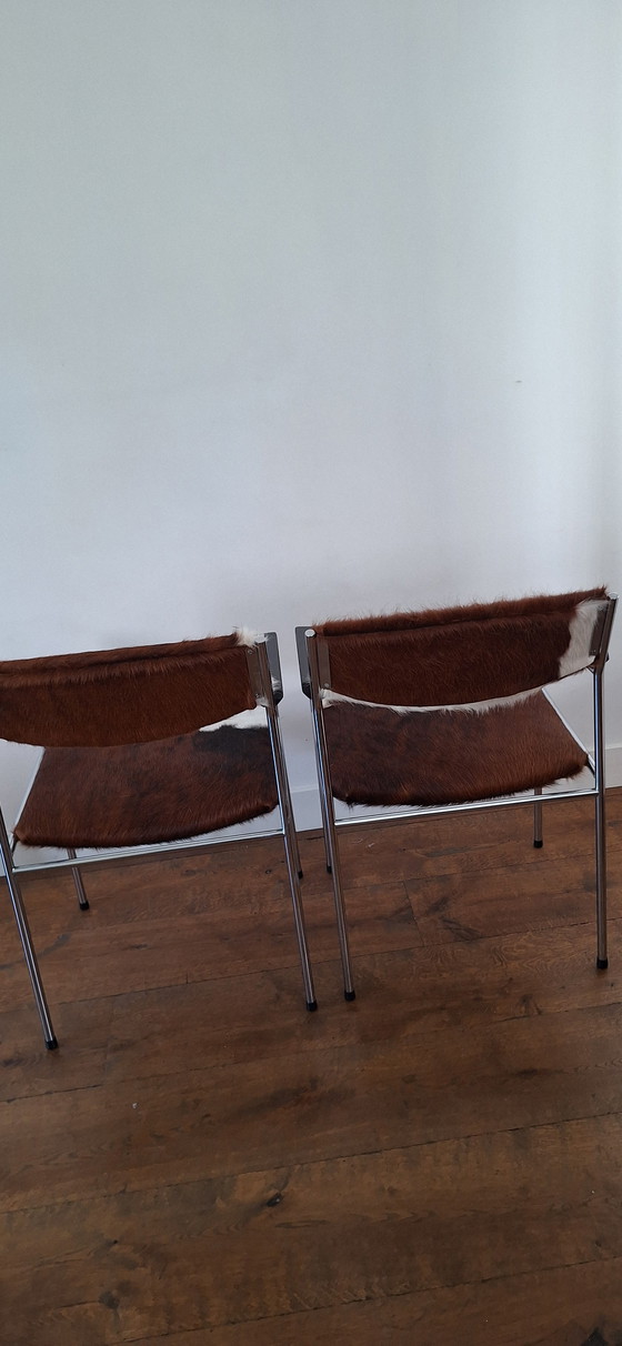Image 1 of Two Gijs van der Sluis chairs with cowhide.