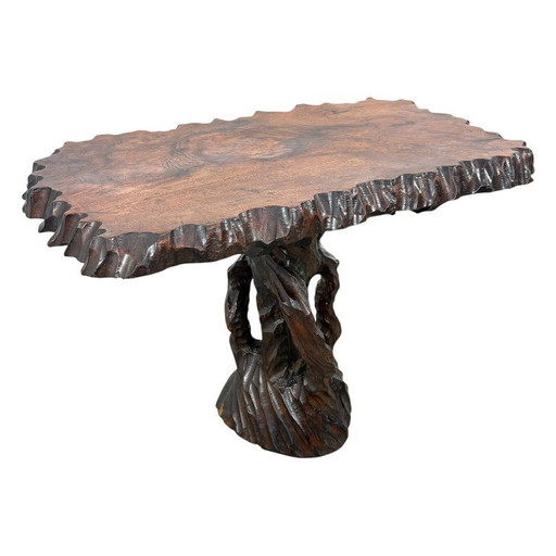 Hand-carved organic side table made of camphor wood – sculptural brutalist design