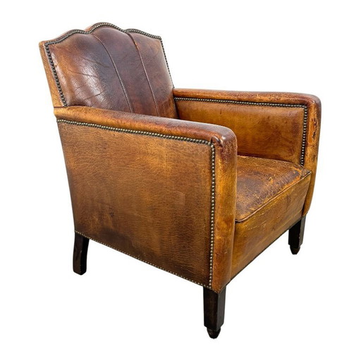 Antieke Franse moustache fauteuil – cognac leren clubstoel – begin 20e eeuw