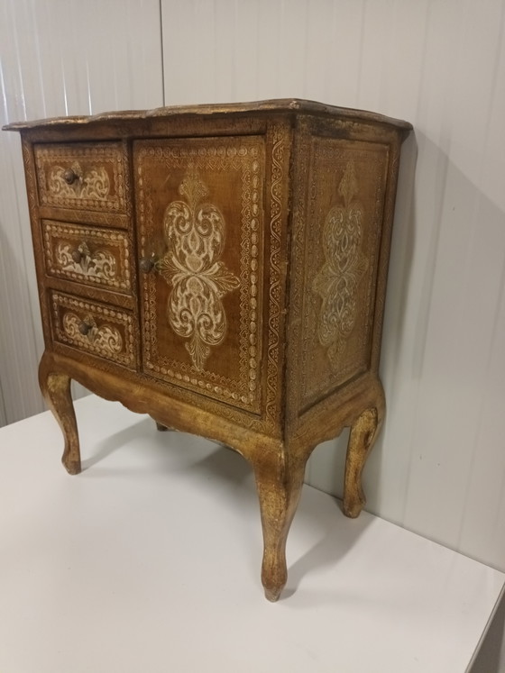 Image 1 of Gold-colored Florentine chest of drawers