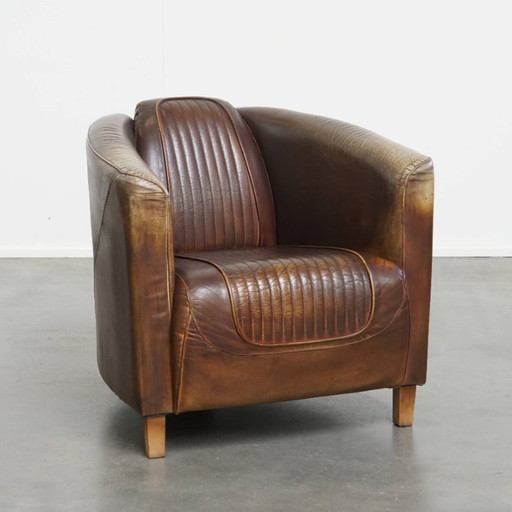 Fauteuil design aviateur en cuir de bœuf avec une palette de couleurs unique