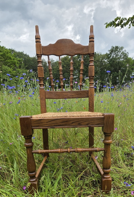 Image 1 of Set van 4 massief eiken stoelen met rieten zitting