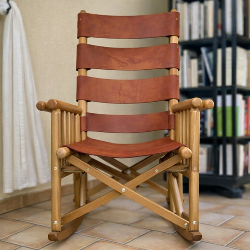 Handcrafted folding rocking chair made of solid wood and natural leather
