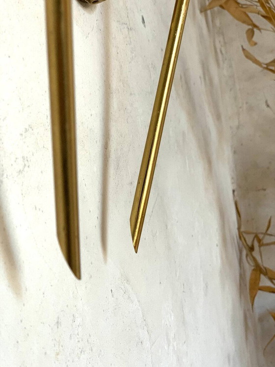 Image 1 of Een paar vintage wandlampen van messing en opaalglas.