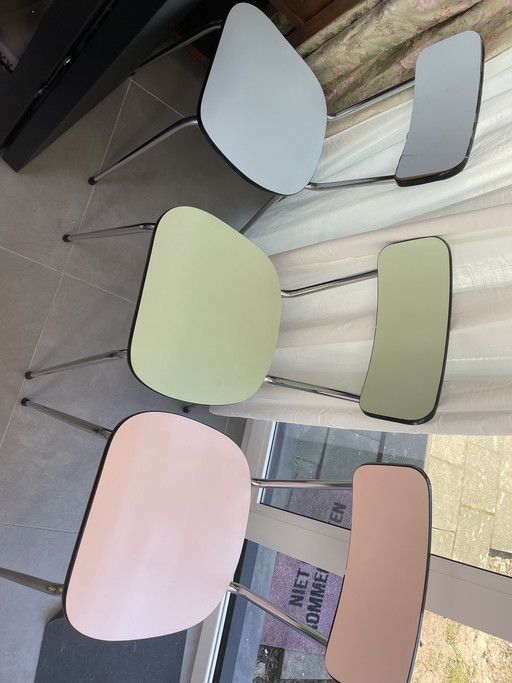 3 unique Formica chairs in pastel colors